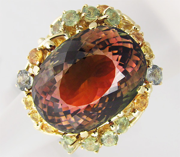 Золото Кольцо с полихромным турмалином, сапфирами и демантоидами-гранатами