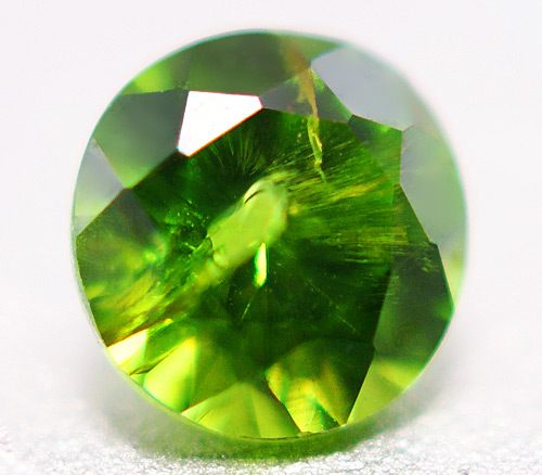 Уральский демантоид 0,15 карат. "Конский хвост"