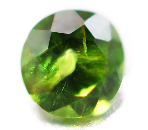 Уральский демантоид 0,15 карат. "Конский хвост"