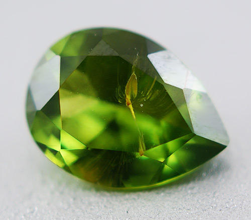 Уральский демантоид 0,65 карат. "Конский хвост"