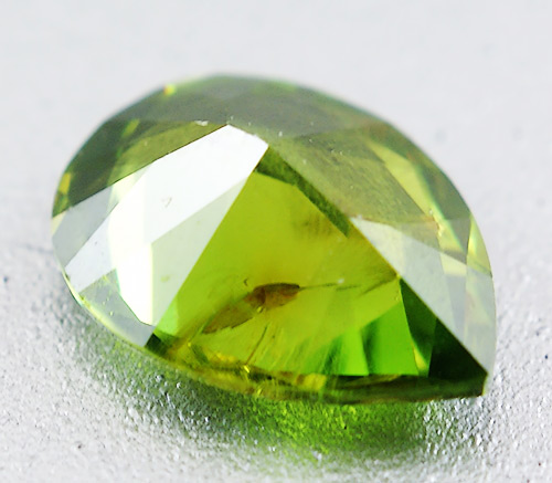 Уральский демантоид 0,65 карат. "Конский хвост"