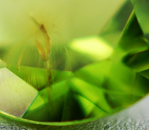 Уральский демантоид 0,65 карат. "Конский хвост"