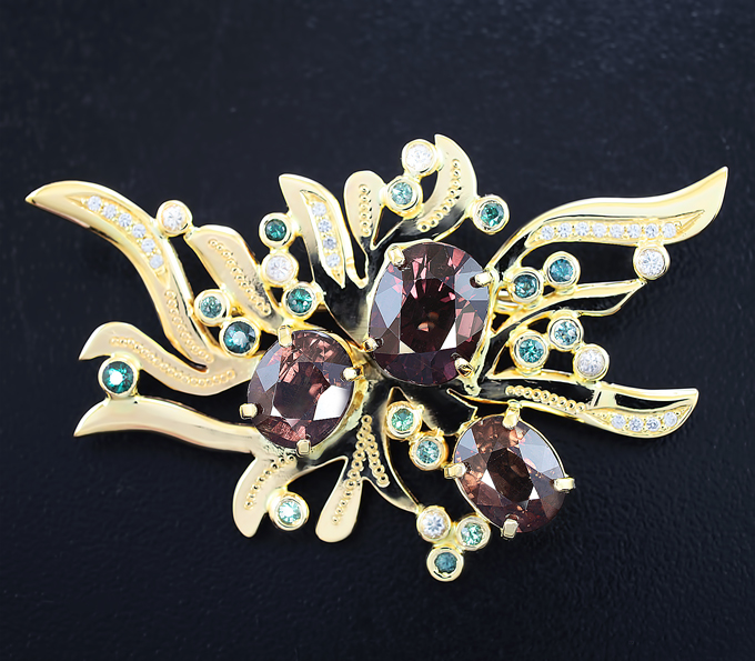 Золото Брошь/кулон с гранатами и цирконами