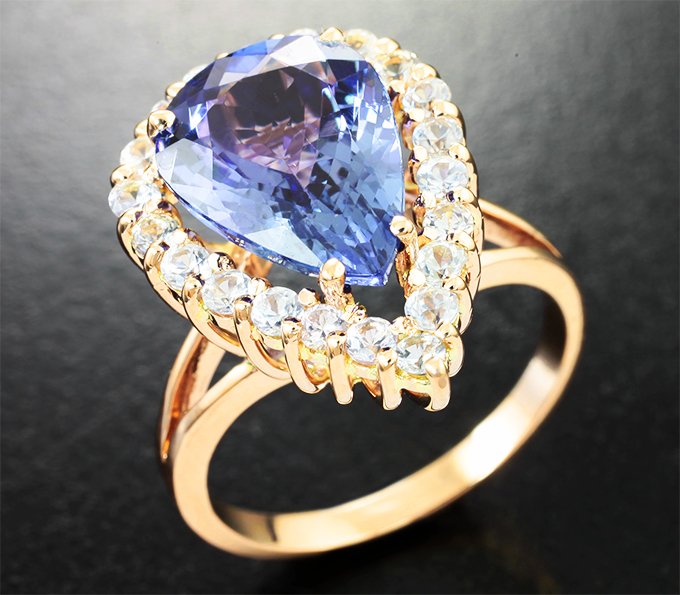 Золото Кольцо с чистейшим крупным танзанитом 4,69 карата и бесцветными цирконами