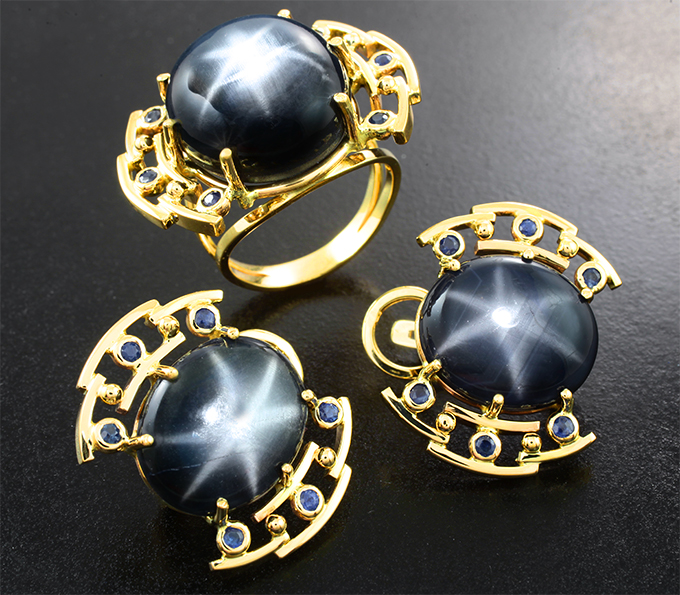 Золото Комплект со звездчатыми сапфирами 63,04 карата и синими сапфирами