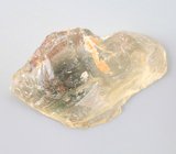 Крупный неограненный полихромный орегонский солнечный камень 17,2 карата