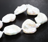 Набор из 9 крупных кремово-белых морских жемчужин барокко на нити 147,9 карата