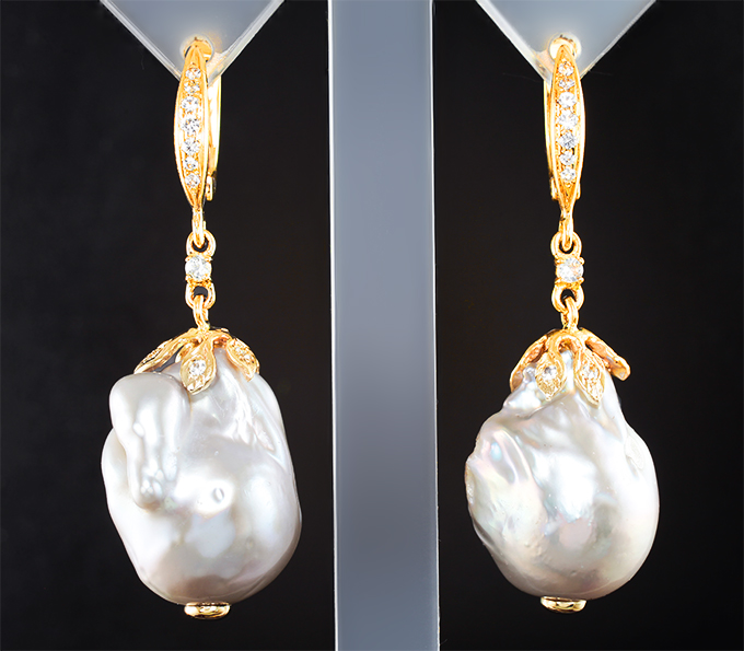 Золото Серьги с морским жемчугом барокко 43,85 карата и цирконами