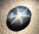 Кольцо с крупным звездчатым сапфиром 13,42 карата и голубыми цирконами Серебро 925