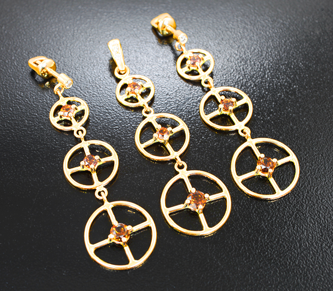 Золото Комплект с топазолитами 1,78 карата и бриллиантами