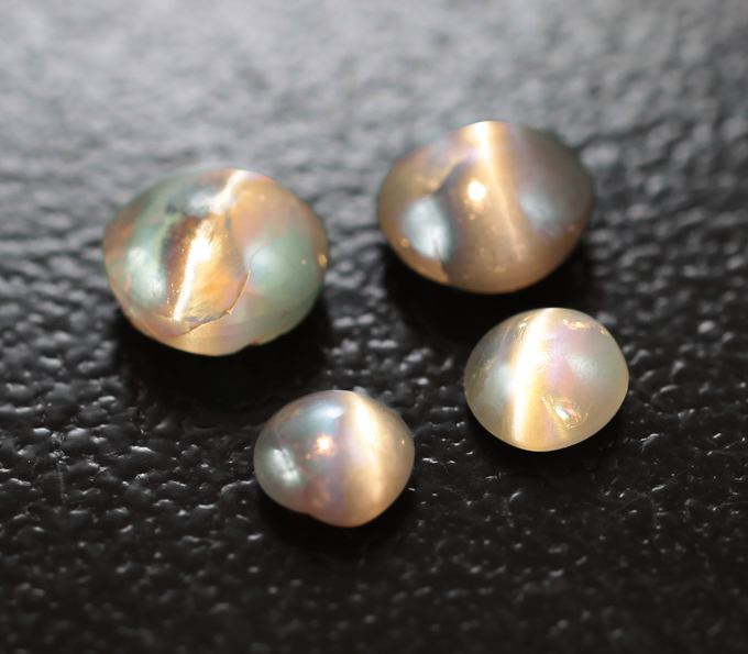 Набор из 4 хризобериллов с эффектом кошачьего глаза 1,55 карата