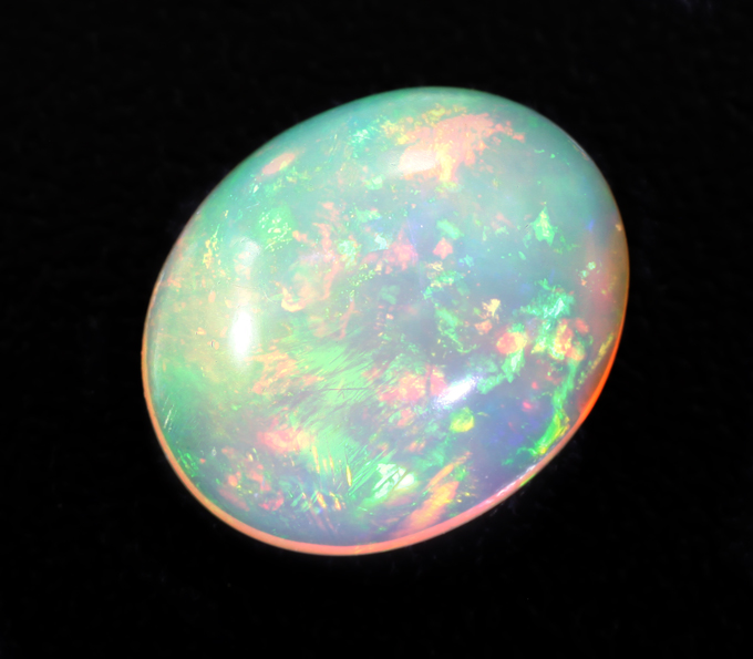 Серьги с кристалличевскими эфиопскими опалами 8,16 карата и цаворитами