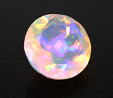 Ограненный эфиопский опал 0,97 карата