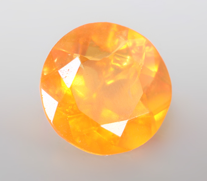 Мексиканский ограненный "огненный" опал 0,67 карата