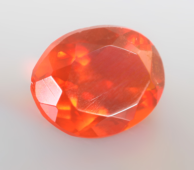 Мексиканский ограненный "огненный" опал 0,68 карата