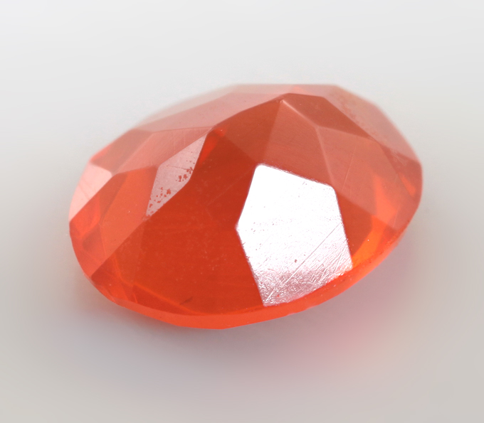 Мексиканский ограненный "огненный" опал 0,68 карата