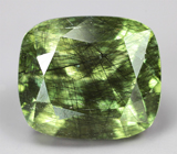 Коллекционный перидот с множественными включениями рутила 4,73 карата