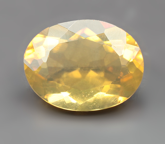 Ограненный бразильский "солнечный" опал 1,28 карата