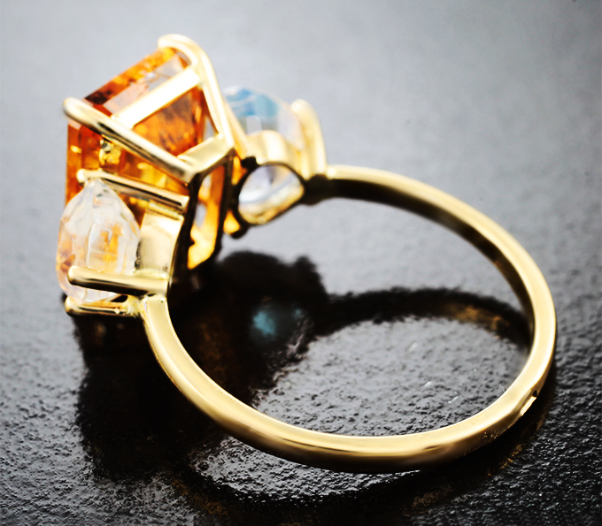 Кольцо с ярко-желтым топазом 5,81 карата и ограненным лунным камнем