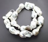 Массивный набор из 14 крупных кремово-белых морских жемчужин барокко на нити 492,6 карата