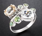 Кольцо с редким данбуритом 1,59 карата, чистейшими цирконами «шампань» и демантоидами гранатами