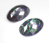 Крупная пара ограненных черных опалов 6,05 карата