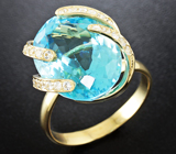 Кольцо с голубым топазом и бесцветными цирконами Золото