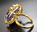 Кольцо с танзанитом 28,6 карата, синими сапфирами и бриллиантами Золото