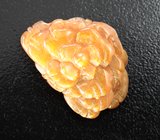 Резной солнечный камень 12,88 карата