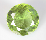 Крупный перидот с включениями рутила 17,51 карата