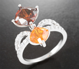 Кольцо с редким бастнезитом 4,19 карата, клиногумитом 1,46 карата и лейкосапфирами