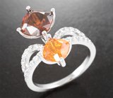 Кольцо с редким бастнезитом 4,19 карата, клиногумитом 1,46 карата и лейкосапфирами