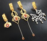 Комплект со спессартинами «фанта» 7,18 карата и разноцветными сапфирами