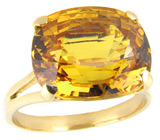 Кольцо с крупным золотисто-желтым сапфиром Золото